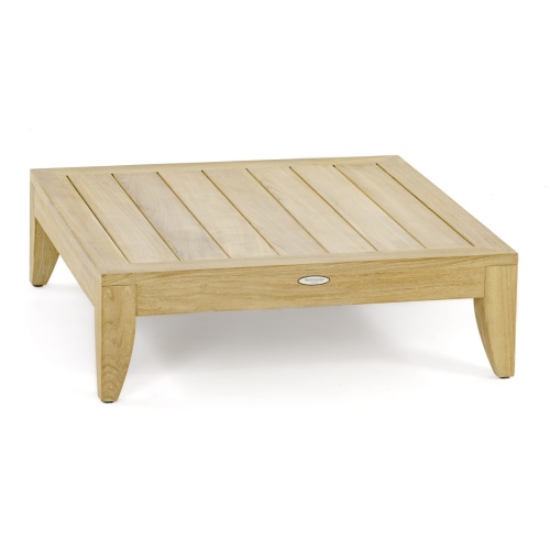 14315 aman dais teak coffee table angled on a white background