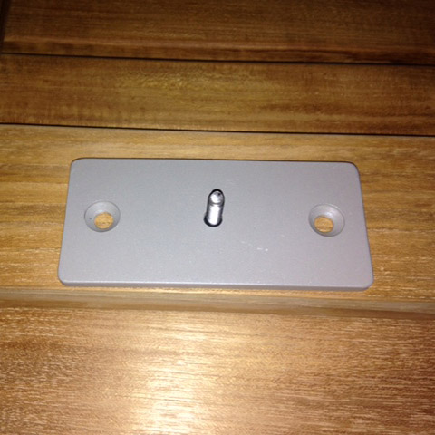 40010 Westminster Bench Anchor Bracket to secure benches in public places on teak table