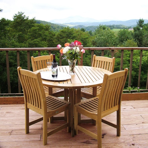70054 Veranda Barbuda 5 piece Dining Set of 4 teak dining side chairs with optional seat cushions and 48 inch round dining table angled on white background 