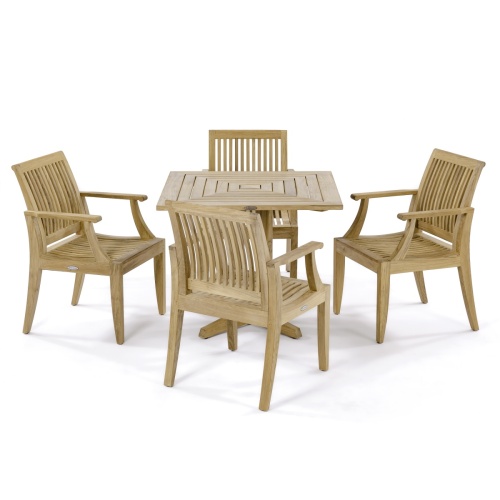 70417 Laguna Pyramid Teak 5 pc Dining Set of Pyramid 36 inch Square Table and 4 Laguna Dining Armchairs in angled view on patio with window and plant in background