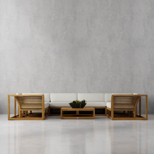 70754 maya seven piece lounge teak set of a Left and Right Sectional and 2 Slipper Chairs and 2 Corner pcs and Ottoman Coffee Table in angled front view on white background