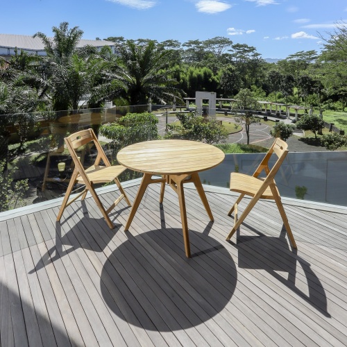 70823 Surf Round 3 piece Dining Set of Surf 42 inch Round Table and 2 Folding Side Chairs in angled side view on white background