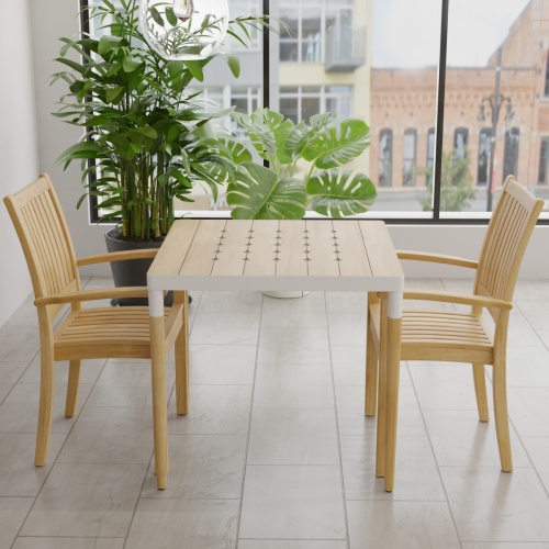 70907 Bloom Sussex 3 pc Dining Set of a Bloom Teak & Powder Coated Aluminum Square Table and 2 Sussex Armchairs side view on tiled floor with 2 plants and windows in background