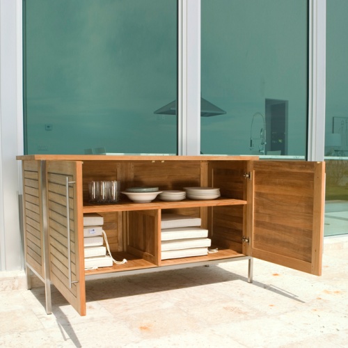 28225 Vogue Sideboard with white bowl of green apples on concrete patio with glass sliding patio doors in background