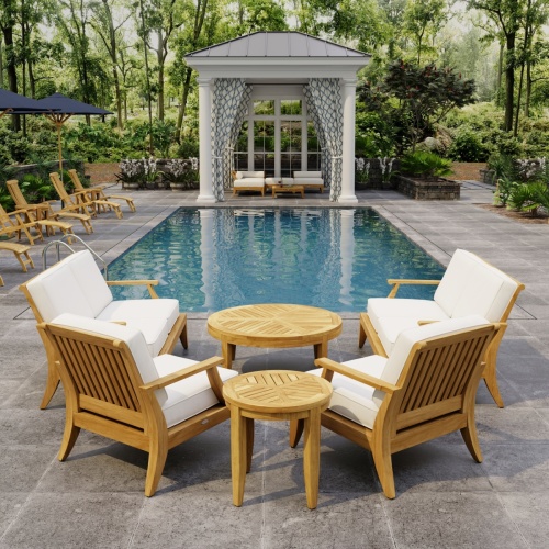 70347 Laguna 6 pc Sofa Set on paver patio front view facing a pool and stone fence with woods and trail in background