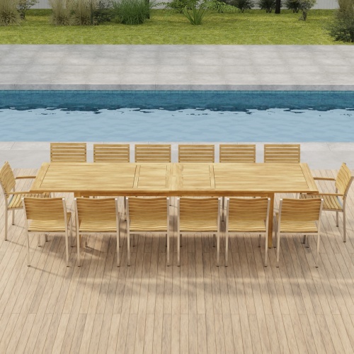 70352 Laguna Vogue 15 piece teak Dining Set of 14 dining armchair and rectangular 11 foot extendable dining table in aerial side view on pavers with pool in background