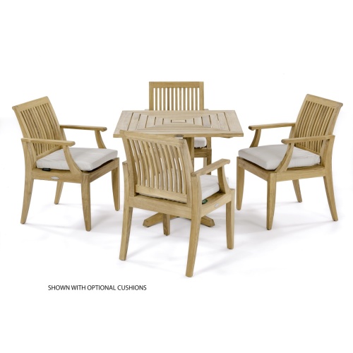 70417 Laguna Pyramid Teak 5 pc Dining Set of Pyramid 36 inch Square Table and 4 Laguna Dining Armchairs in angled aerial view on patio next to pool in background