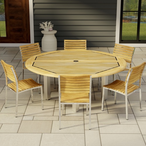 70428 Vogue 7pc Round Dining Set of Vogue Round DIning Table and 6 Vogue Side Chairs in side view on tile patio with window and door of house in background