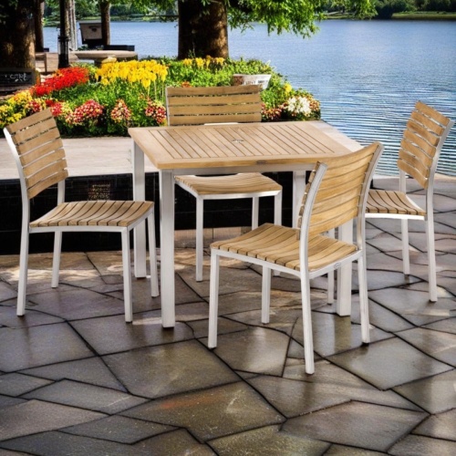 70443 Vogue 5 piece Bistro Square Dining Set of Vogue 36 inch Square Dining Table and 4 Side Chairs with optional canvas colored seat cushions on wood dock with river and trees in background 