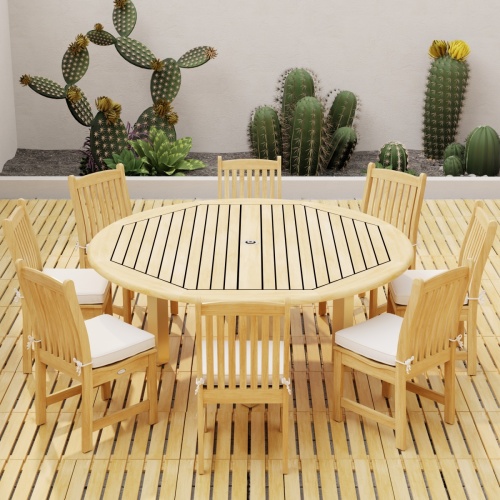 70492  Vogue Veranda Dining Set with optional umbrella and seat cushions on teak tiled patio angled side view in front of a privacy wall with cactus plants in background