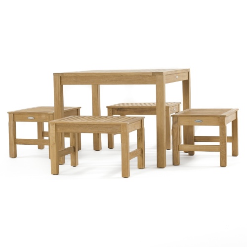 70520 Brunswick 5 piece Cafe Set of 4 teak 24 inch long stools side and 36 inch square teak table side view on patio surrounded by plants and trees in background
