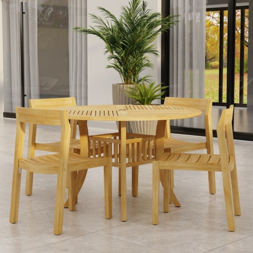70573 Grand Hyatt Horizon Dining Set of Grand Hyatt 48 inch Round Dining Table and 4 Teak Horizon Dining Side Chairs on patio with potted plants and glass door in background  