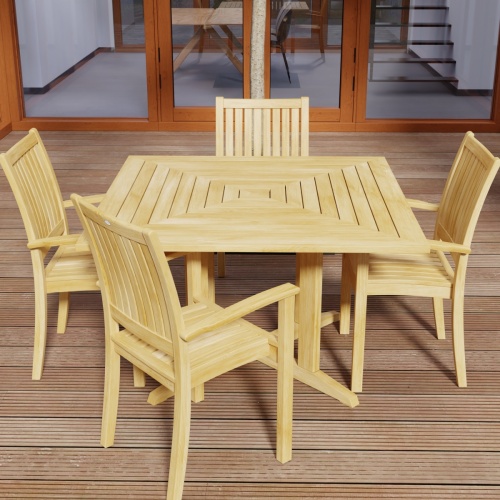 70685 Sussex Pyramid 5 pc Dining Set of Pyramid Square Dining Table and 4 Sussex Armchairs in side angled view on wood deck with door to house in background 
