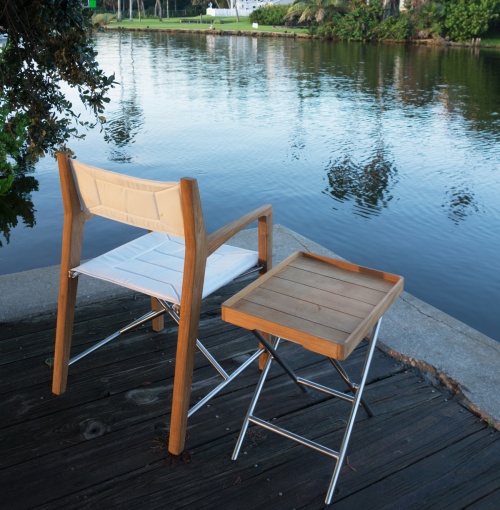 28815DP odyssey ottoman with serving tray on dock overlooking lake