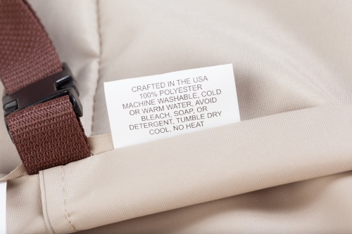 62152DP Laguna Lounge Chair Cover showing closeup of cover label and securing clasp