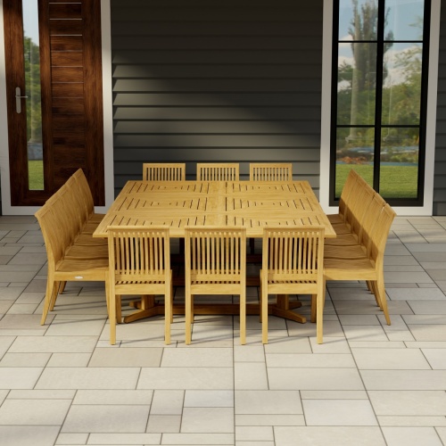 70288 Pyramid Teak Dining Set for 16  in corner view on covered patio with house and wood door in the background