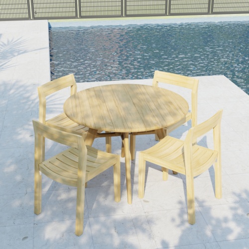70355 Horizon Surf 5 pc Cafe Dining Set in angled side view on stone patio with pool and fence in the background