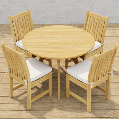 70356 Veranda Surf 5 pc Cafe Dining Set of a Surf 42 inch round dining table and 4 Veranda Side Chairs with optional seat cushions angled aerial view on wood deck with ocean background  