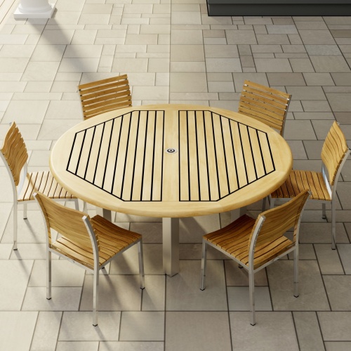 70428 Vogue 7pc Round Dining Set of Vogue Round DIning Table and 6 Vogue Side Chairs in side angled view on tile patio with window and door of house in background 