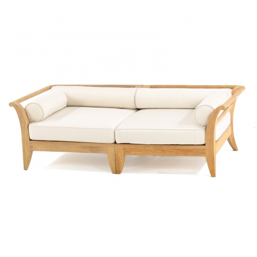 70429 Aman Dais Teak 2 pc Loveseat Set of 2 Aman Dais Corner Sectionals with cushions in angled front view on patio next to 2 potted plants against a wall in background