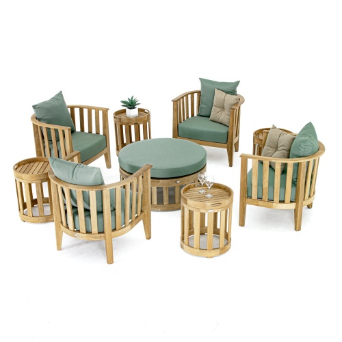 70437 Kafelonia 9 pc teak Deep Seat Set with two throw pillows on two chairs potted plant and two wine glasses on teak side tables on white background 