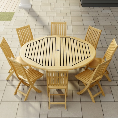 70486 Vogue Teak Barbuda Dining Set for 8 of Vogue Dining Table and 8 Barbuda folding Side Chairs angled on tiled patio with window and house and pillar and white fence with trees in background 