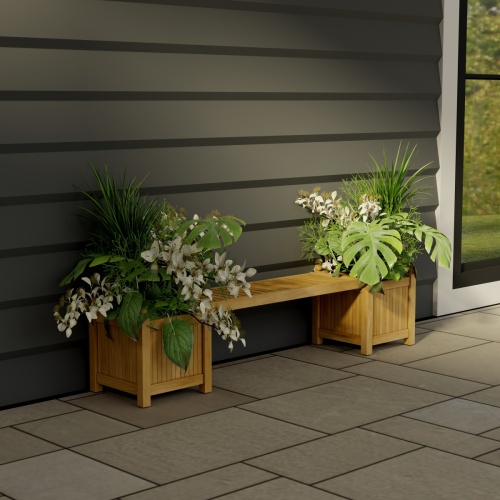 70530 Single Planter Bench Set of 2 planters filled with plants and 1 seat panel front view on stone patio with a house wall in background