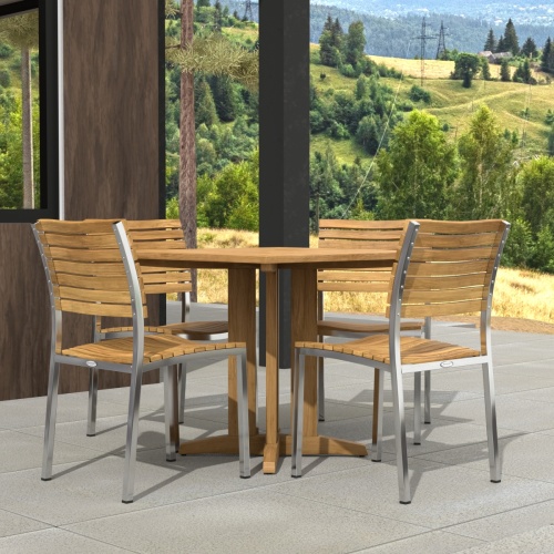 70574 Vogue Pyramid 5 pc Cafe Set of Pyramid Dining Table and 4 Vogue Side Chairs angled side view on tiled patio next to a wall and window with hills in the background