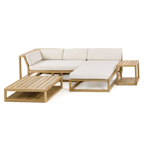 70658 Maya 4pc Lounge Set of Maya Right Side and Daybed Sectionals and Ottoman Coffee Table and Side Table  on patio against a wall with potted plant and ocean background