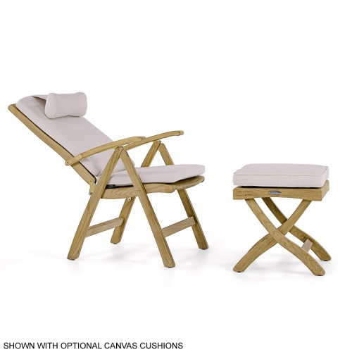 70706 Barbuda Teak Recliner & Ottoman Side Table Set showing Barbuda Recliner Teak Armchair with Optional Seat Cushion in back view on dock with lake and trees in background 