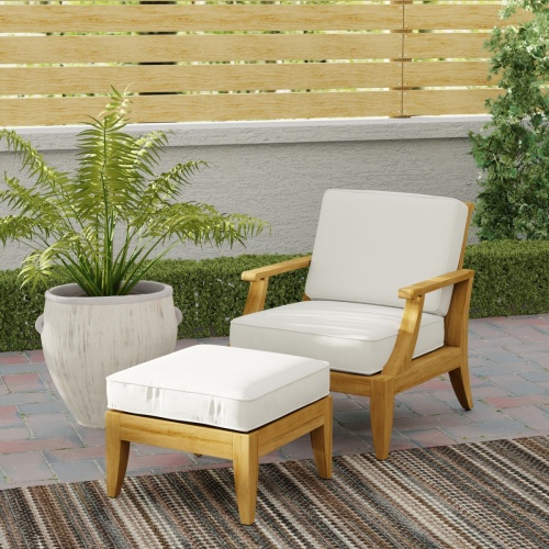 70707 Laguna Chair & Ottoman Set of Laguna Chair and Ottoman in angled front view on brick paver patio with potted plant and landscaping and privacy wall of house in background