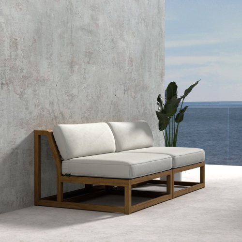 70821 Maya Armless Love Seat showing 2 Maya Slipper Chairs in angled front view on tile next to a potted plant with a wall in the background