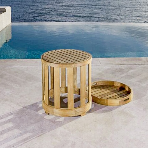 70872 Kafelonia teak Side Table with tray to side on concrete patio in front of pool overlooking ocean