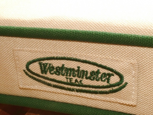 74103 Glen Tuff 5 foot Bench Cushion closeup view of Westminster Teak Logo on cushion side