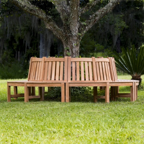 13691ST Buckingham Teak Tree Hugger Bench on patio around a tree with house in background