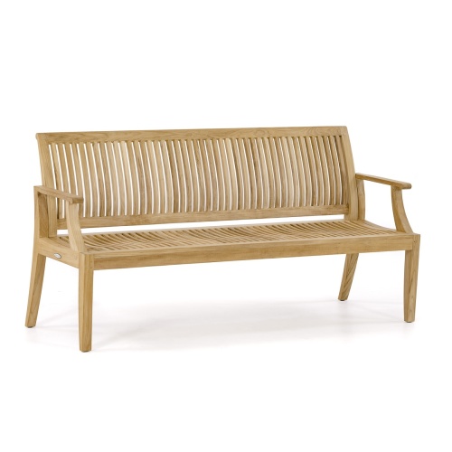 13812 Laguna 5 foot long Teak Bench on grass park with walkway in front and trees in background