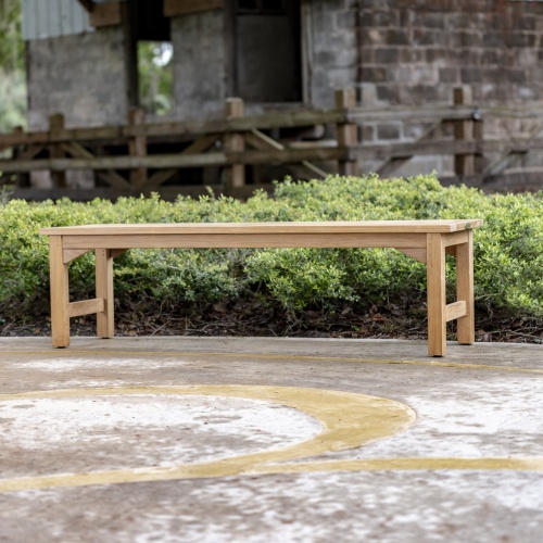 13929 Veranda teak 5 foot long Backless Bench aerial end view on concrete walkway with grass in background