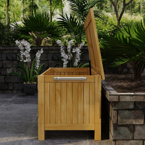 18203 somerset rectangular storage box in side view with open lid on deck with landscape plants in background