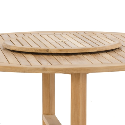 18705 round 32 inch teak lazy susan on teak table side view on white background