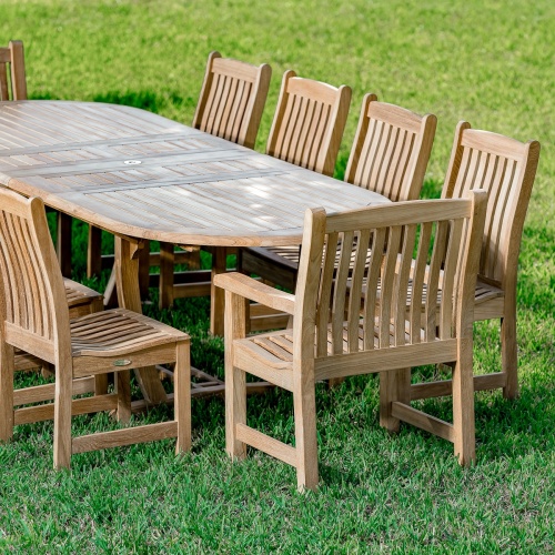 70008 Montserrat Veranda 11 piece teak oval dining set aerial view on a grass field 