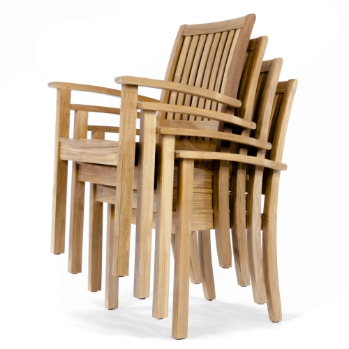 70033 Sussex Barbuda 5 piece Dining Set with optional seat cushions overhead view with potted flowering plant on center of table top on curved wooden deck with plants in background