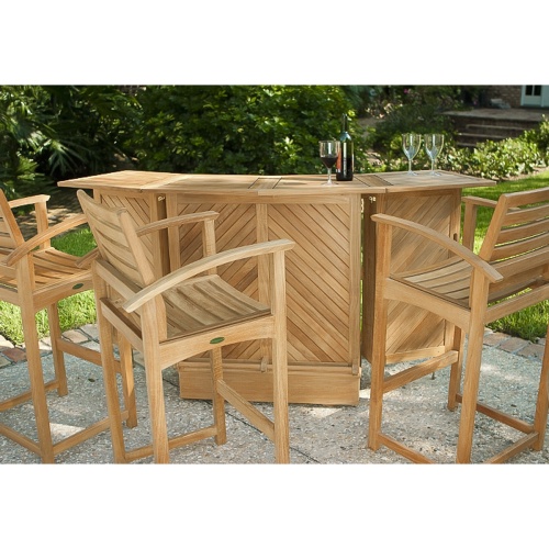 70072 somerset teak bar and stool set opened front view with wine bottle and three wine glasses on concrete patio and trees and steps to house in background