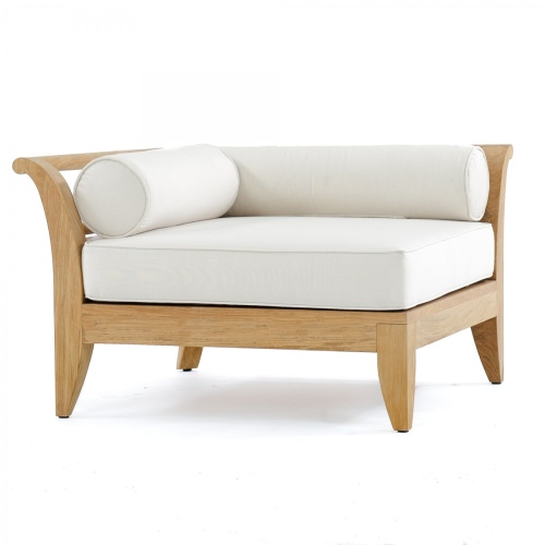 70284  Aman Dais 4 pc Day Bed of 2 Aman Dais corner sectionals and 2 ottoman in aerial side view on outdoor patio next to a wall and potted plant and ocean in background