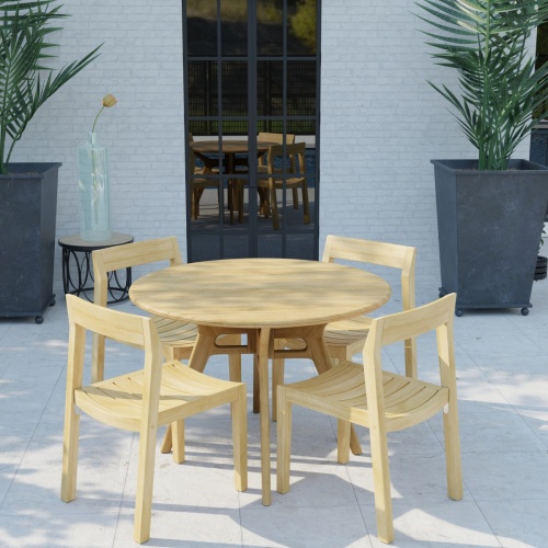 70355 Horizon Surf 5 pc Cafe Dining Set in aerial side view on stone patio with 2 potted plants and window in the background