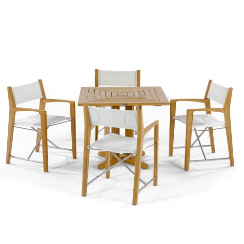 70455 Odyssey Pyramid 5 piece Bistro Set showing closeup of Pyramid 36 inch Square Table and 4 Odyssey Folding Chairs on terrace with ocean and blue sky in the  background 