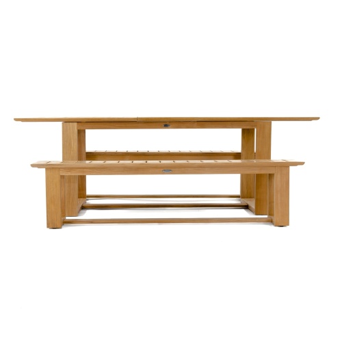 70497 Horizon teak Picnic Dining Set on outdoor deck with stone steps in front of table plants in paver planters on side with shrubs and windows of house in background