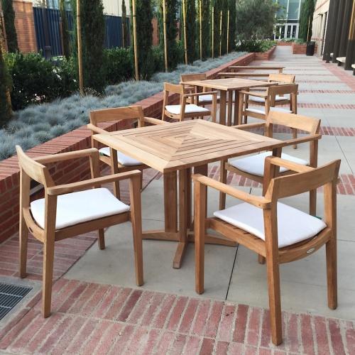 70531 Horizon Pyramid 5 piece Dining Set showing 3 in a restaurant next to large windows overlooking a lake and mountains in background