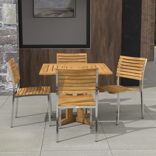 70574 Vogue Pyramid 5 pc Cafe Set of Pyramid Dining Table and 4 Vogue Side Chairs angled aerial view on tiled patio with wall and window in the background
