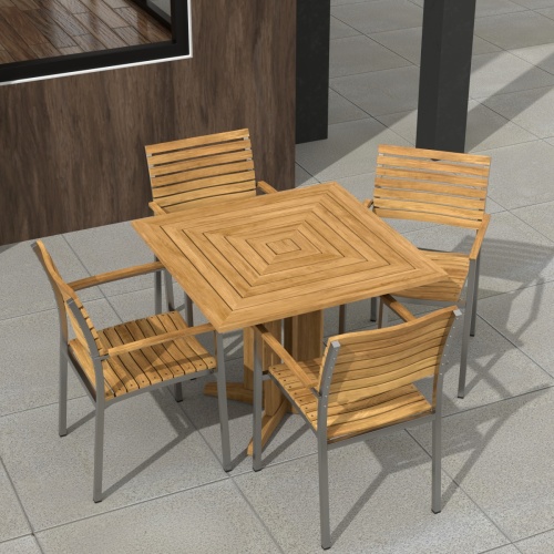 70575 Vogue Pyramid 5pc Dining Set in angled corner view of table top on patio with a stone wall in background