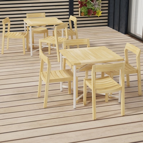 70596 Odyssey Horizon Teak and 316L Stainless Steel Dining Set showing 2 sets in angled aerial view on wood deck with privacy wall with succulents in the background